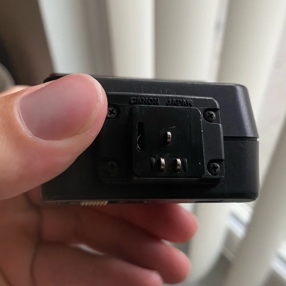 Canon Speedlite model 244T hot shoe flash for Canon Cameras.